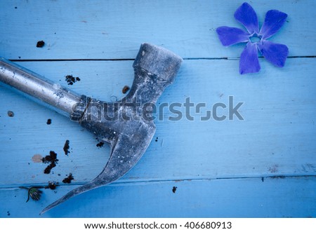 Hammer isolated blue background