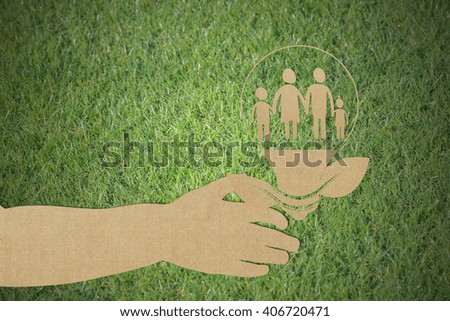 Paper cut of eco on green grass,eco, earth, organic, energy