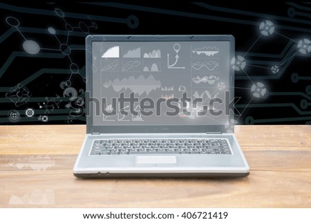 laptop with graph on wooden table,Creative thinking drawing business success strategy plan ideas on wooden table background