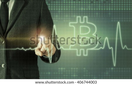 Businessman touching the screen about currency chart