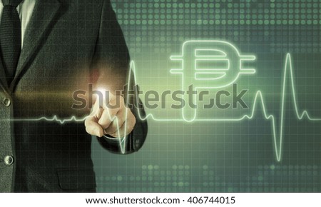 Businessman touching the screen about currency chart