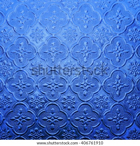 blue color glass with thai pattern style