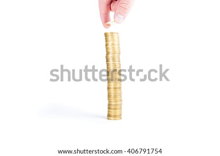 stack gold coins with reflection and hand with coin isolated on white