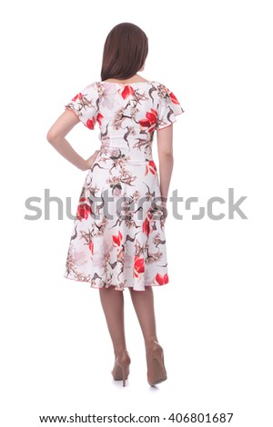 pretty young woman wearing floral dress Royalty-Free Stock Photo #406801687