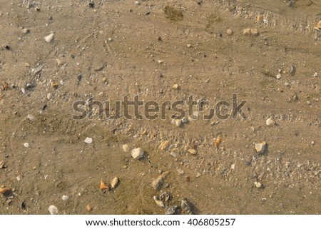 Texture  water streak on sand the beach