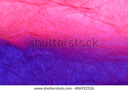 Texture of pink and blue striped crumpled paper for pattern background