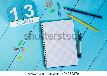 August 13th. Image of august 13 wooden color calendar on blue background. Summer day. Empty space for text. International Left Handers Day Royalty-Free Stock Photo #406969870