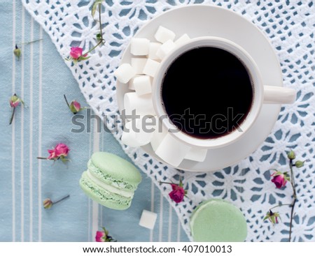 cup of coffee, marshmallows, sugar and cakes.  picture with soft focus
