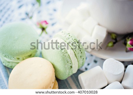 closeup cakes, cup of coffee, marshmallows and sugar.  picture w