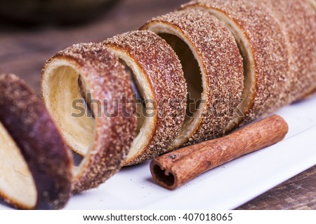 Hungarian a round loaf with the cinnamon and brown sugar Royalty-Free Stock Photo #407018065