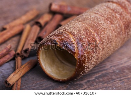 Hungarian a round loaf with the cinnamon and brown sugar Royalty-Free Stock Photo #407018107