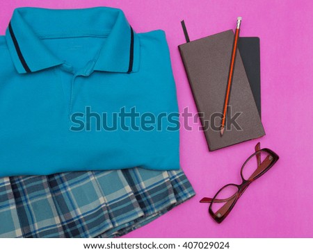 Outfit of student.Different objects on color background.