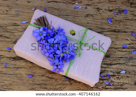 Style if decor: rustic decoration of bouquets and gift boxes with linen cloth and cord
