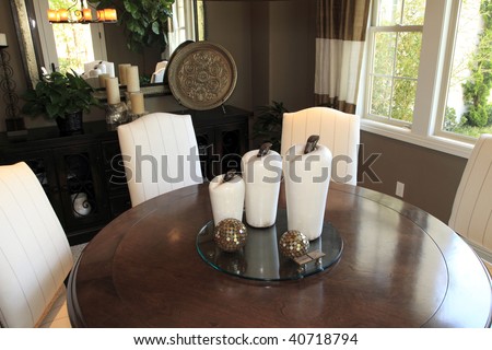 Luxury home dining table with modern furniture and decor.