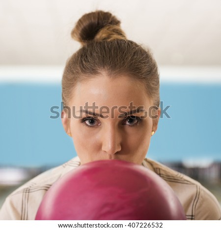 Woman focused on her following shot