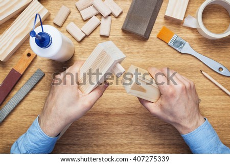 Woodworking workshop table top scene. Making of loose tenon joint.  DIY concept. Royalty-Free Stock Photo #407275339