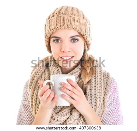Beautiful girl enjoying a cup of tea, isolated on white