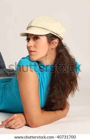 A Beautiful Female in hat, studio shot