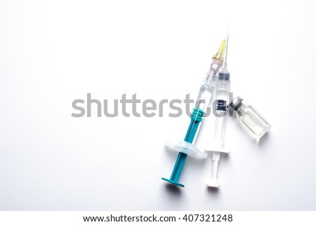 Syringe, medical injection. Medicine isolated plastic vaccination equipment with needle on white background. Liquid drug or narcotic. Health care in hospital. Royalty-Free Stock Photo #407321248