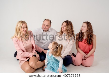 family, big family on a white background, children, brothers and sisters, friendly children, children laughing on a white background, heading for the designer, copy space