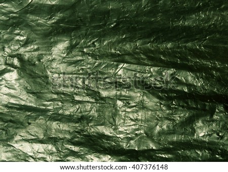Green plastic bag texture. Background and texture for design.