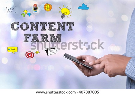 CONTENT FARM person holding a smartphone on blurred background