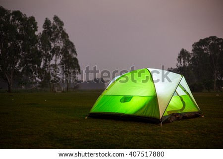 Camping in forest at night