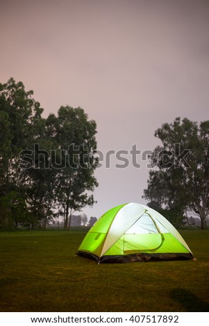 Camp in forest at night