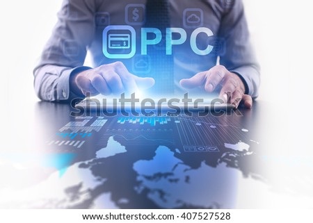 Businessman using tablet pc and select PPC.