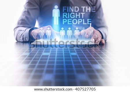 Businessman using tablet pc and select Find the right people. Royalty-Free Stock Photo #407527705