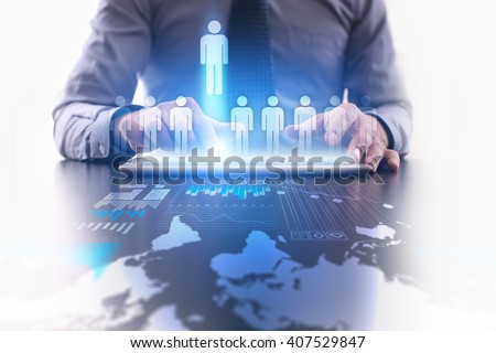 Human reesources management and recruitment. Businessman using modern tablet computer. Royalty-Free Stock Photo #407529847