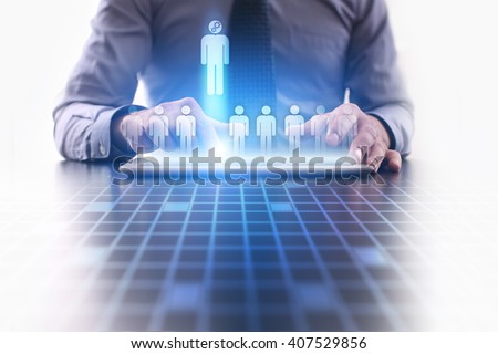Human reesources management and recruitment. Businessman using modern tablet computer. Royalty-Free Stock Photo #407529856