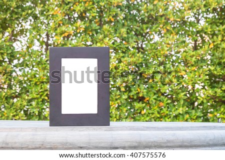 Closeup frame for photo isolated on cement desk in the park
