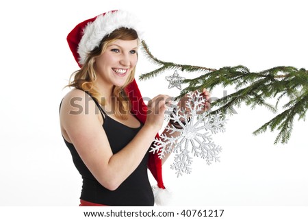young woman holding a decorative snow flake