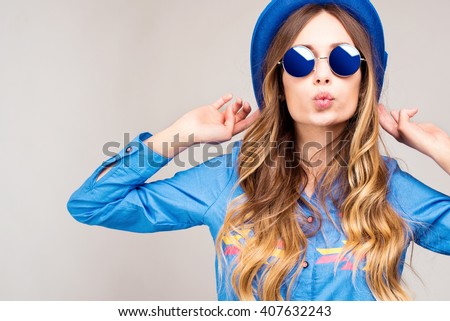 Cool hipster student woman wearing eyewear glasses . Caucasian female university student looking at camera smiling happy. Royalty-Free Stock Photo #407632243