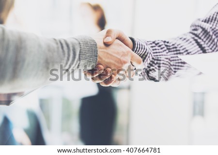 Business partnership meeting. Picture businessmans handshake. Successful businessmen handshaking after good deal. Horizontal, blurred background Royalty-Free Stock Photo #407664781