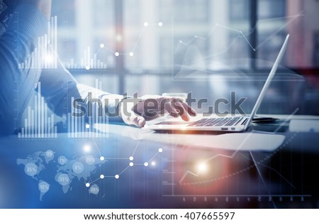 Business concept photo.Businessman working investment project modern office.Touching pad contemporary laptop. Worldwide connection technology,stock exchanges graphics interface. Horizontal