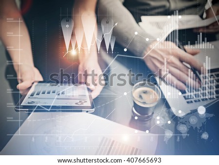 Photo female hands holding modern tablet. Finance department managers working new global project in office. Using electronic devices. Graphics icons, worldwide stock exchanges interface. Horizontal