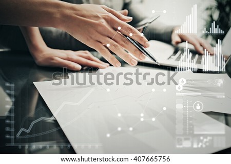 Photo female hands with pen.Businessmans crew working investment project modern office.Using contemporary laptop. Worldwide connection technology icons,stock exchanges graphics interface. 