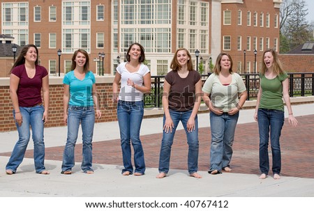 Group of College Girls Jumping