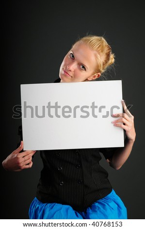 Casual woman with a banner smiling isolated
