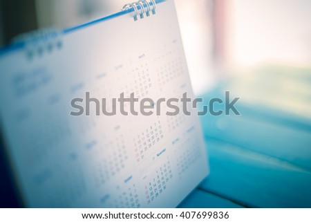blurred calendar in film tone. Royalty-Free Stock Photo #407699836