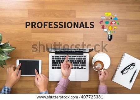 PROFESSIONALS Two Businessman working at office desk and using a digital touch screen tablet and use computer objects on the right, top view copy space