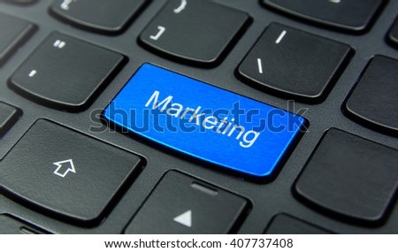 Business Concept: Close-up the Marketing button on the keyboard and have Azure, Cyan, Blue, Sky color button isolate black keyboard