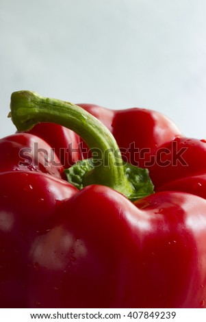 Fresh red bell pepper against a white background