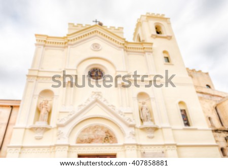 Defocused background with facade of St. Francis of Paola Church in Pizzo Calabro, Italy. Intentionally blurred post production for bokeh effect