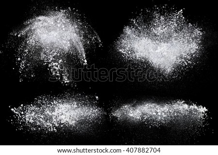 Set of dust powder splash clouds isolated on black background Royalty-Free Stock Photo #407882704