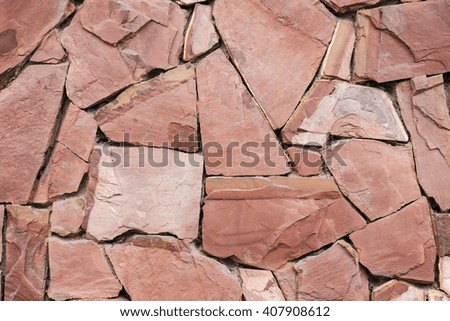Red stone on the wall.