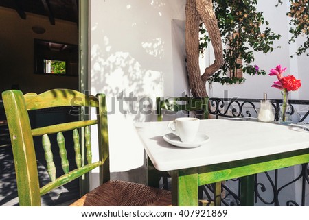 A cup of coffee on table, mediterranean style