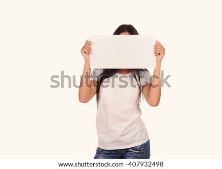 Beautiful girl holding a blank billboard isolated on white background